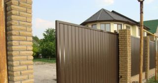 Купить откатные ворота из профнастила Камень-на-Оби, цена от 1786 руб.